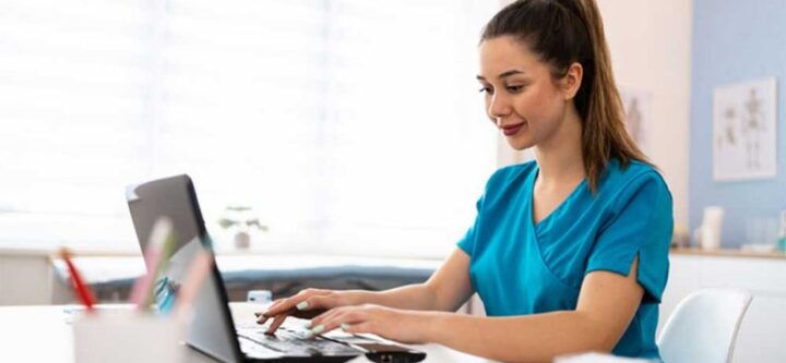 medical-assistant-using-laptop-793x468